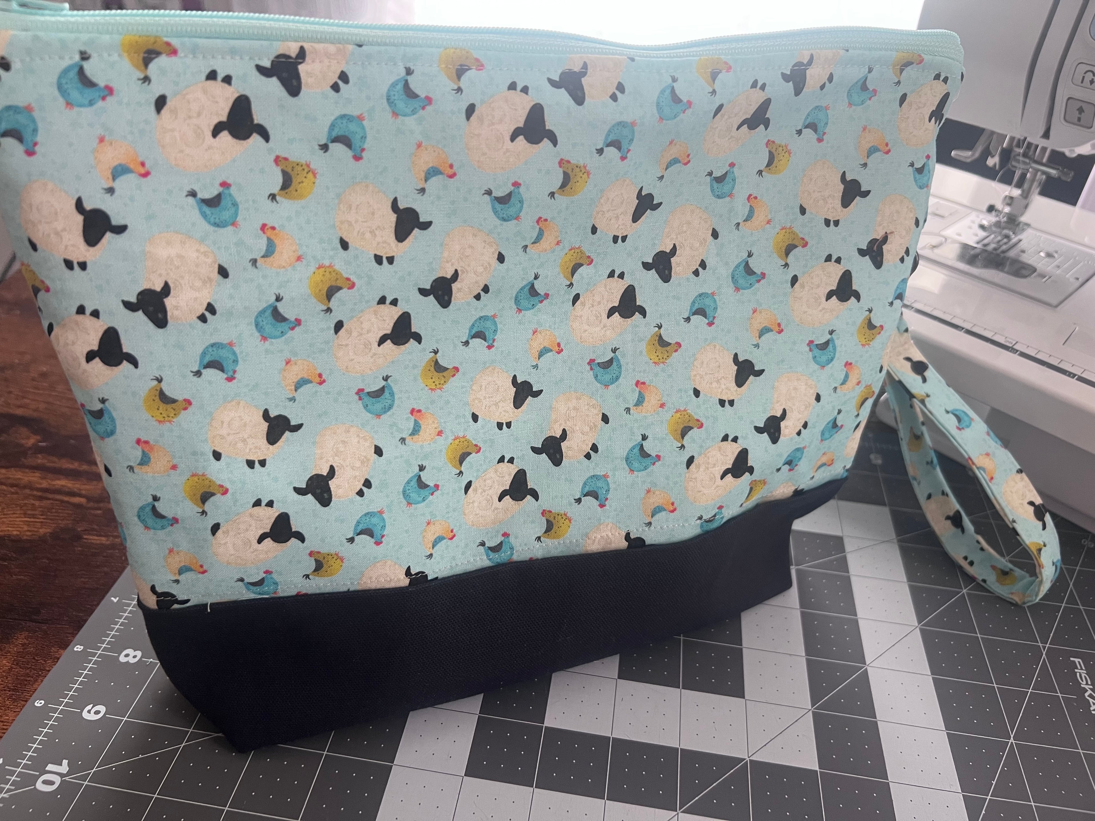 Medium quilted sheep project bag with strap wristlet